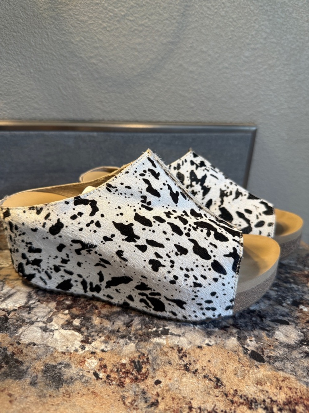 Volatile Ponyhair Leather Black and White Cow-Spot Slip-On Platform Wedges
